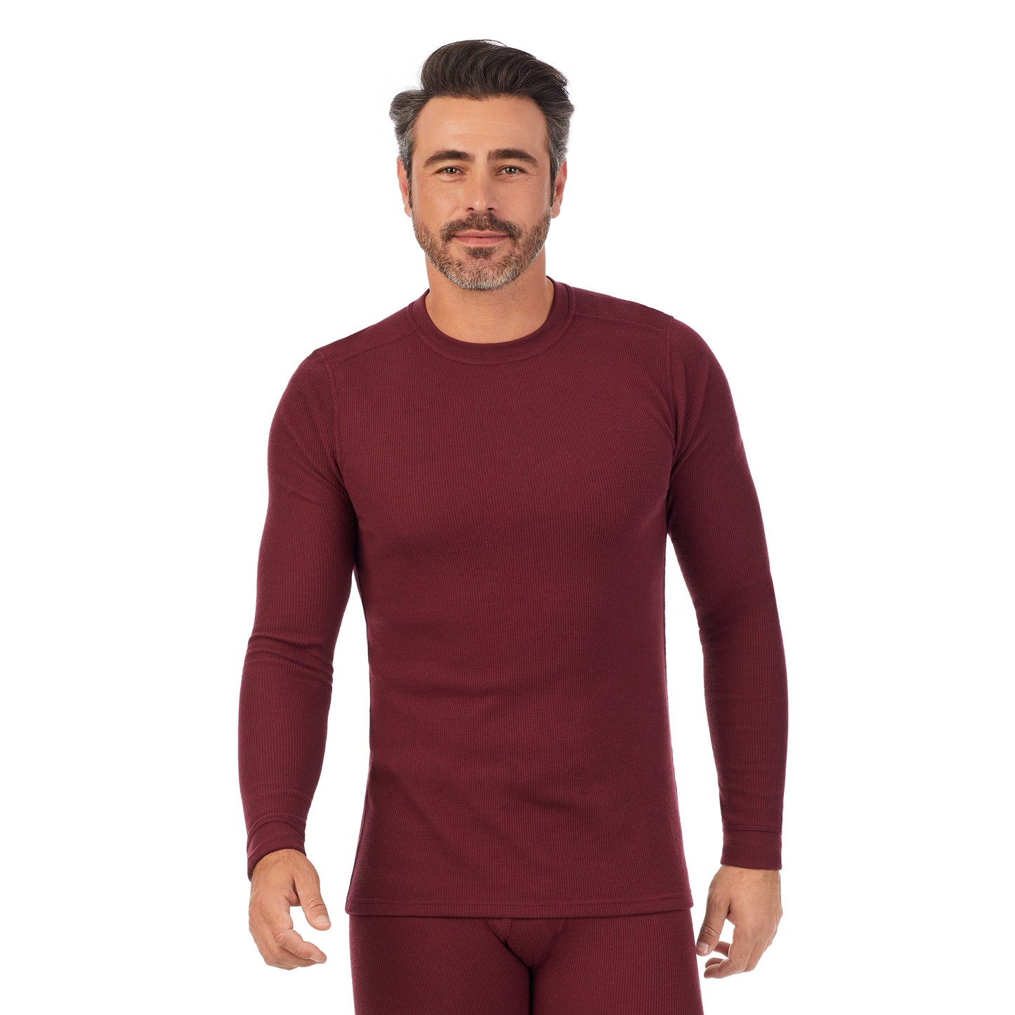 Dark Port; Model is wearing size M. He is 6'2", Waist 32", Inseam 34". @A man wearing a Dark Port waffle thermal long sleeve crew.