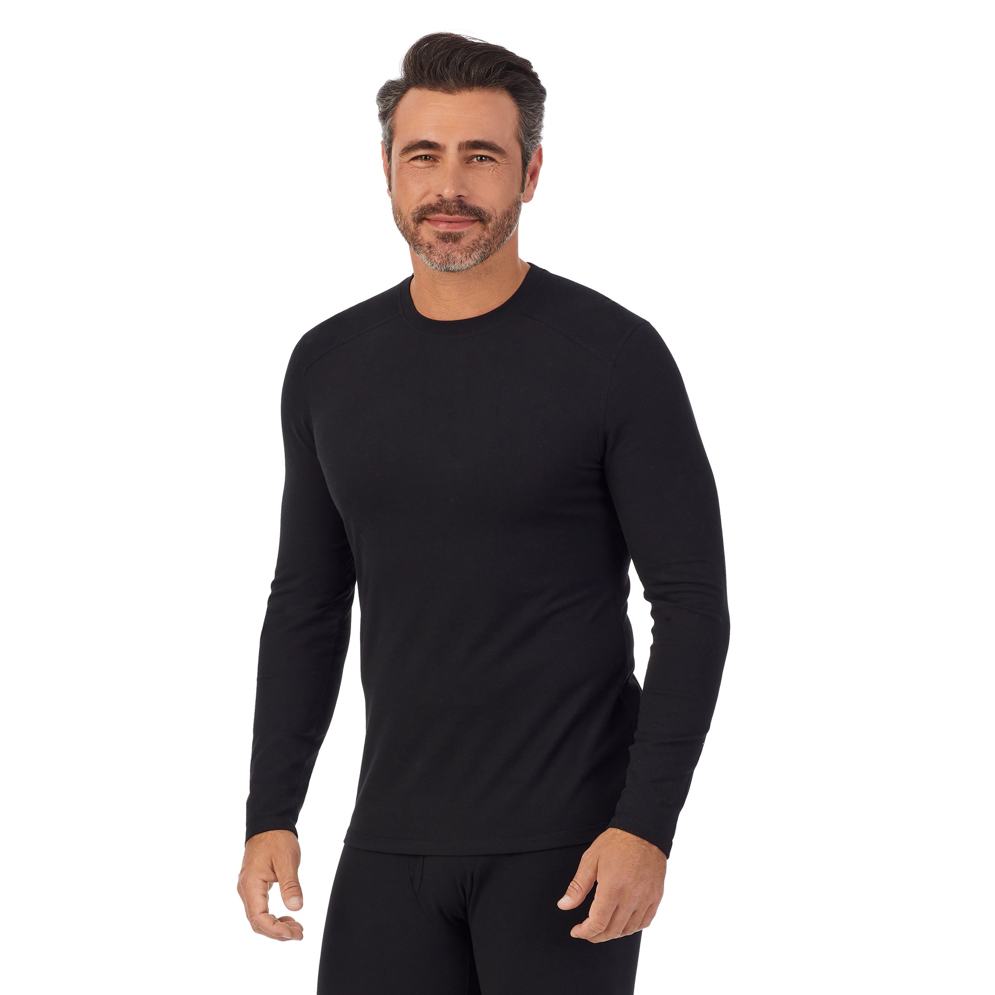 A man wearing a black long sleeve crew