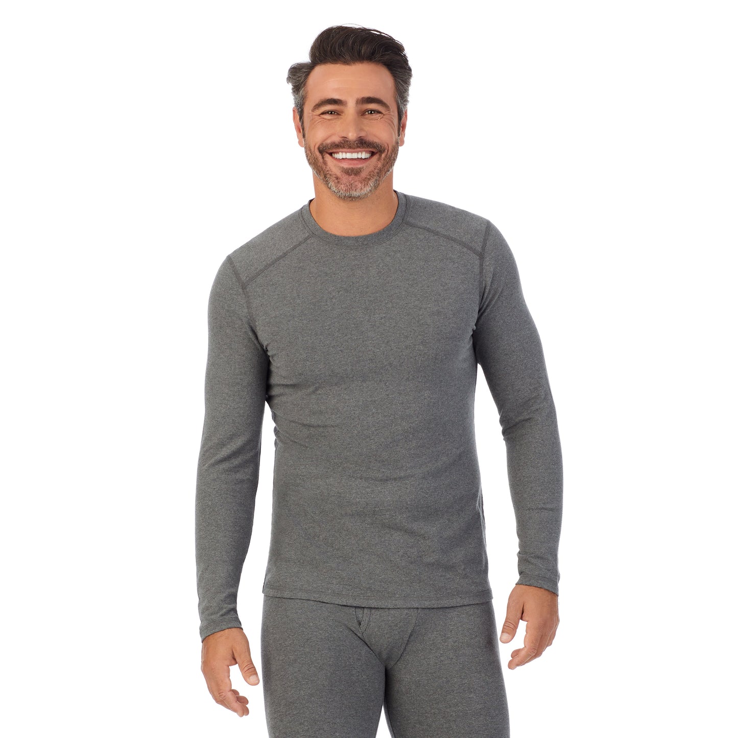 Grey Heather; Model is wearing size M. He is 6'2", Waist 32", Inseam 34". @A man wearing a Grey Heather long sleeve crew