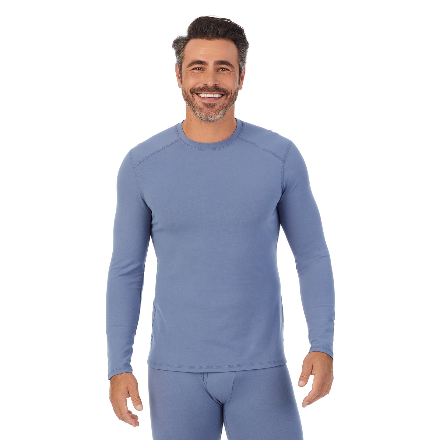Light Denim; Model is wearing size M. He is 6'2", Waist 32", Inseam 34". @A man wearing a Light Denim long sleeve crew