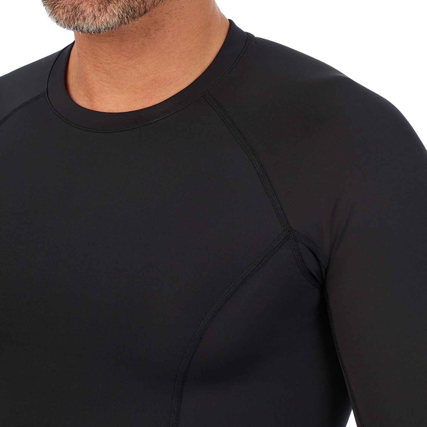 Black; Model is wearing size M. He is 6'2", Waist 32", Inseam 34". @A man wearing black Lite Compression Long Sleeve Crew