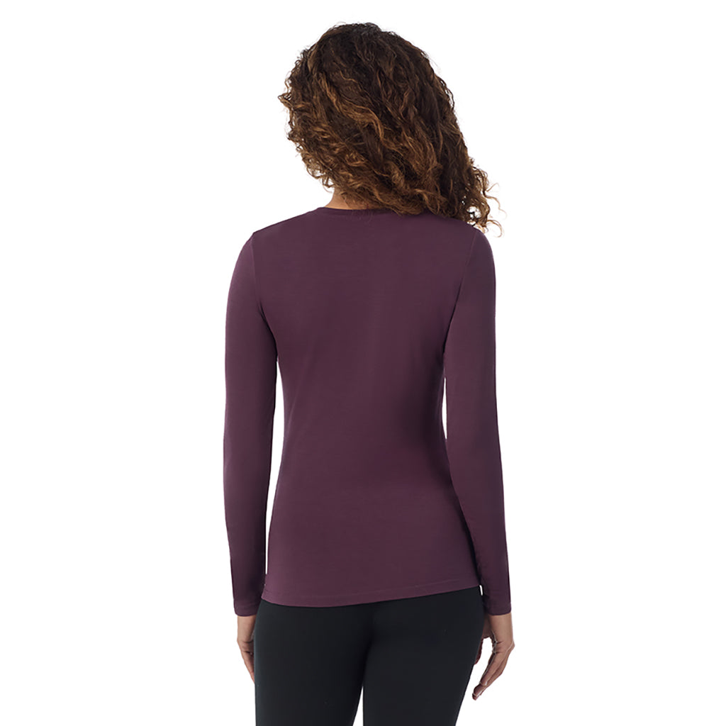 Boysenberry; Model is wearing size S. She is 5’9”, Bust 34”, Waist 23”, Hips 35”. @A lady wearing boysenberry longsleeve crew.