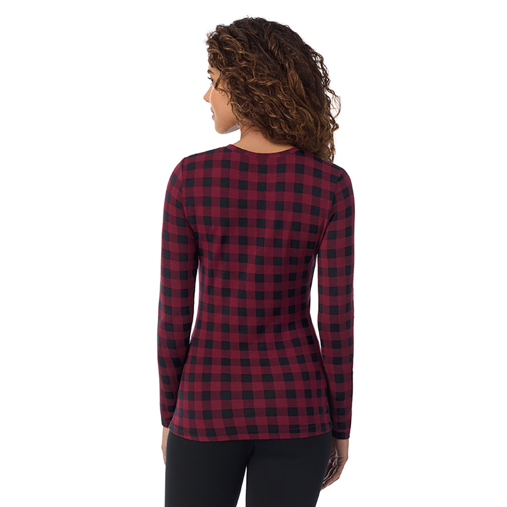 Cabernet Buffalo Check; Model is wearing size S. She is 5’9”, Bust 34”, Waist 23”, Hips 35”. @A lady wearing cabernet buffalo check longsleeve crew.
