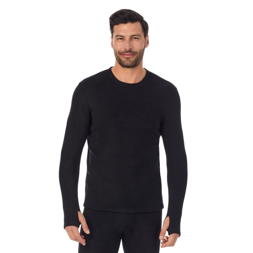 Black; Model is wearing a size M. He is 6’2”, Waist is 32”, Inseam 34”@A man wearing black long sleeve fleecewear crew.