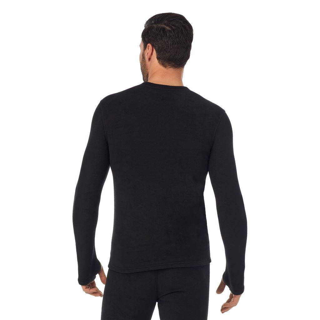 Black; Model is wearing a size M. He is 6’2”, Waist is 32”, Inseam 34”@A man wearing black long sleeve fleecewear crew.