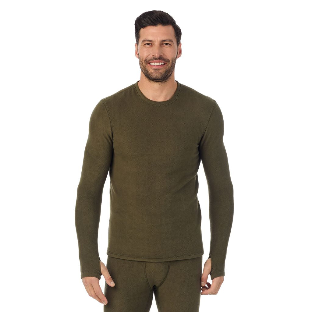 Dark Olive; Model is wearing a size M. He is 6’2”, Waist is 32”, Inseam 34”@A man wearing dark olive long sleeve fleecewear crew.