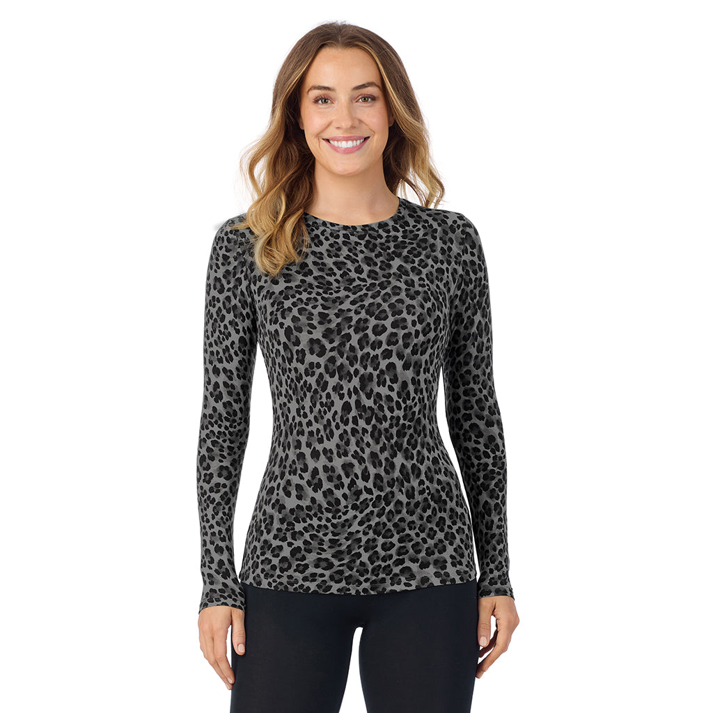 Charcoal Leopard; Model is wearing size S. She is 5'11.5", Bust 34", Waist 26", Hips 37". @A lady wearing a charcoal leopard long sleeve stretch crew.