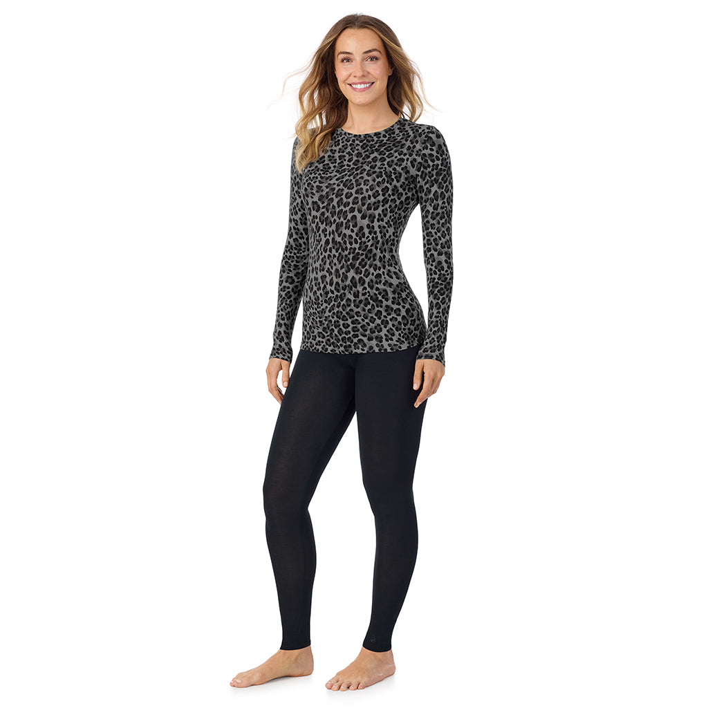 Charcoal Leopard; Model is wearing size S. She is 5'11.5", Bust 34", Waist 26", Hips 37". @A lady wearing a charcoal leopard long sleeve stretch crew.