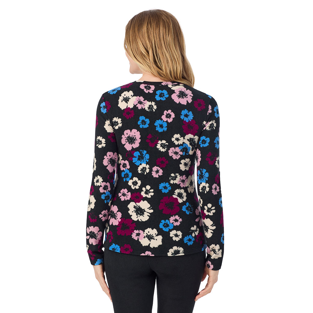 Black Floral; Model is wearing size S. She is 5'11", Bust 33", Waist 24", Hips 34".@A lady wearing Black Floral long sleeve crew
