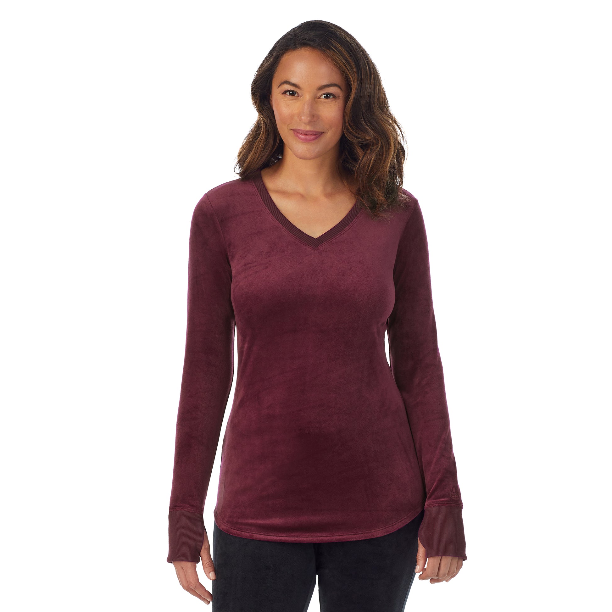 A lady wearing Purple Beet stretch velour long sleeve v-neck