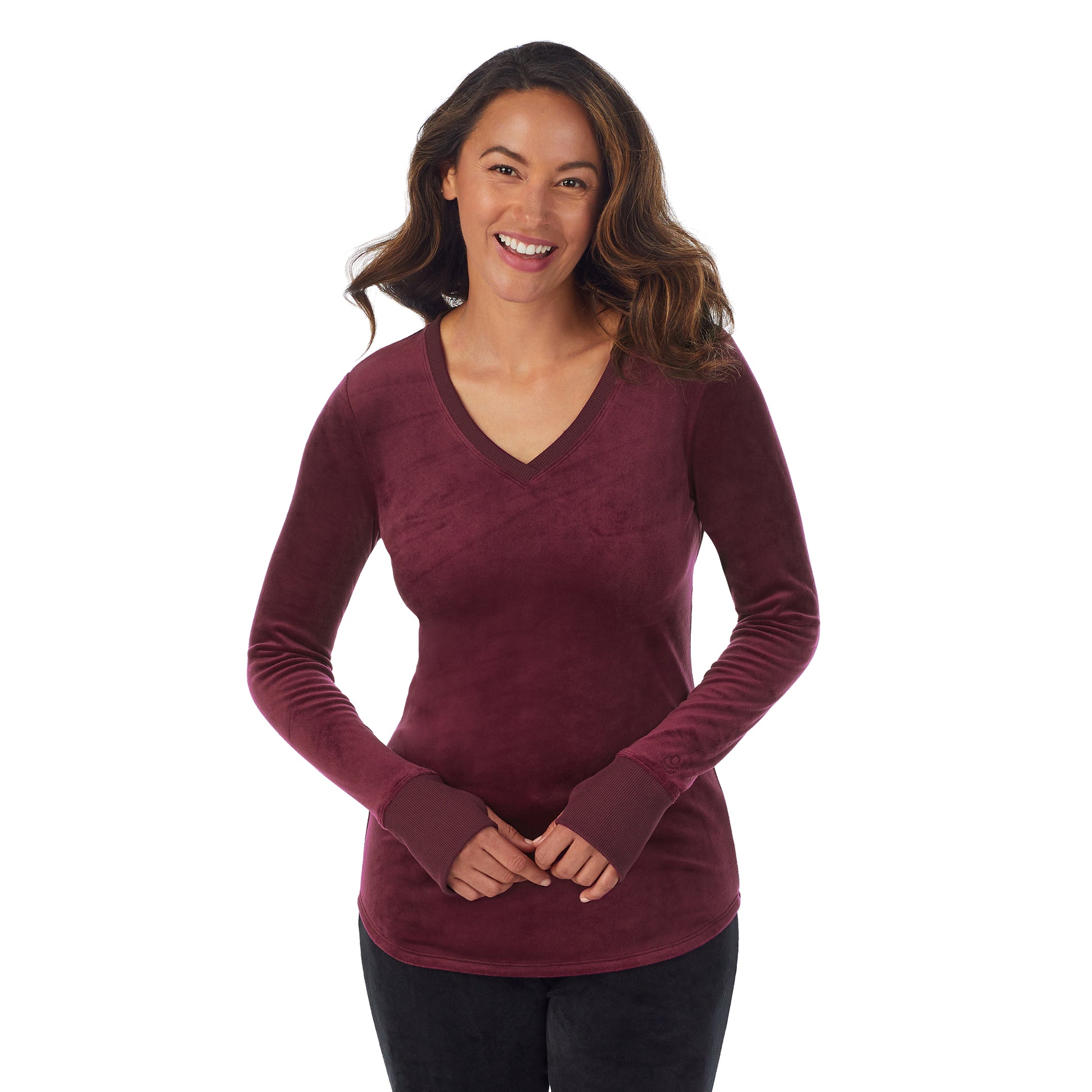 A lady wearing Purple Beet stretch velour long sleeve v-neck