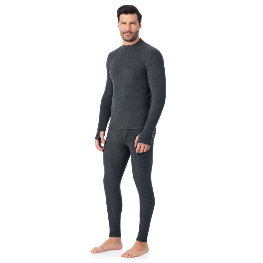 Black Heather; Model is wearing a size M. He is 6’2”, Waist is 32”, Inseam 34”@A man wearing Black Heather Fleecewear Long Sleeve Mock Neck