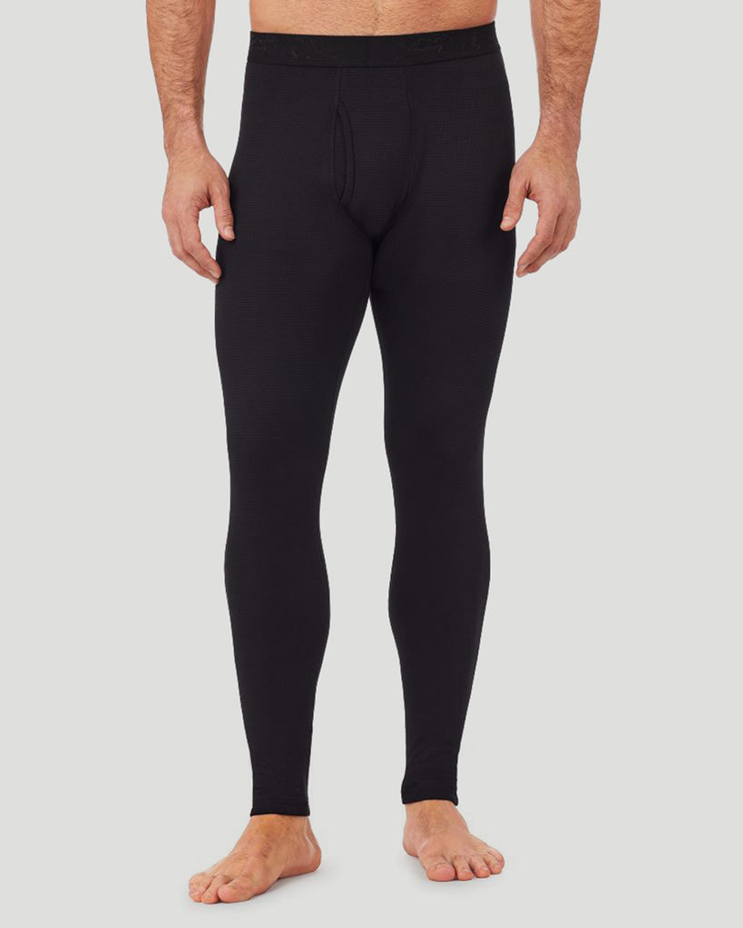A man wearing a black X fleece pant.