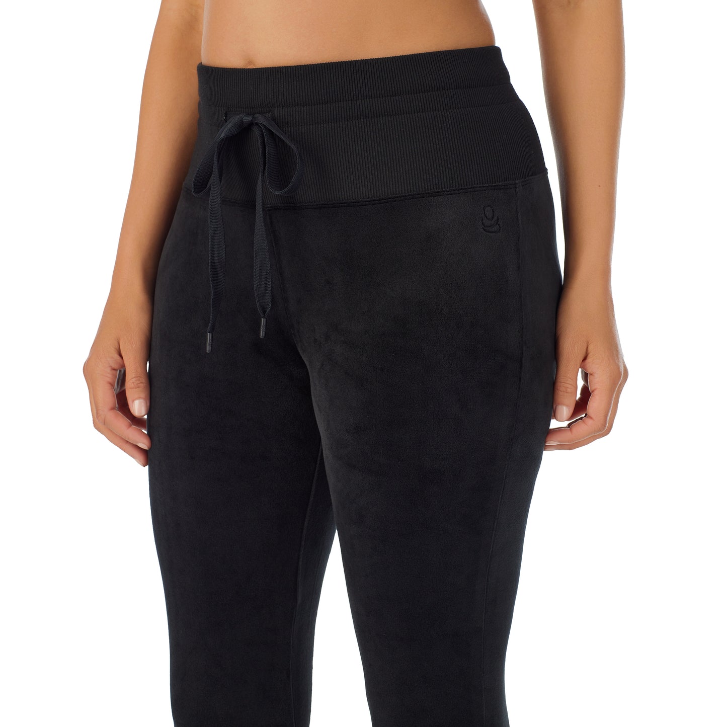 Black; Model is wearing size S. She is 5'8", Bust 34", Waist 26”, Hips 36"@A lady wearing black stretch velour legging