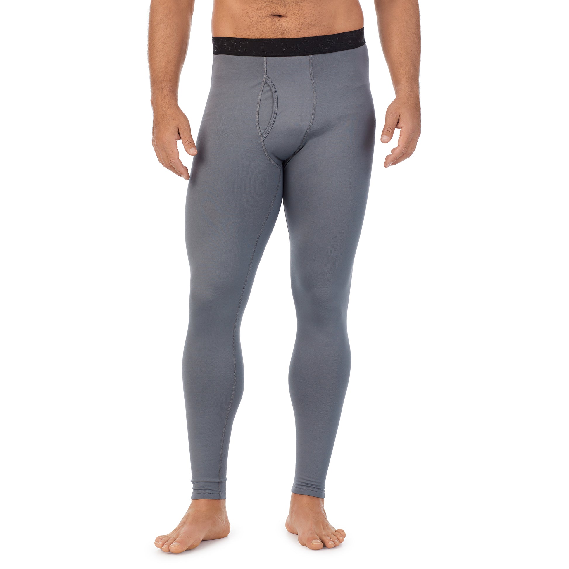 A man wearing nickel grey arcticore pant.