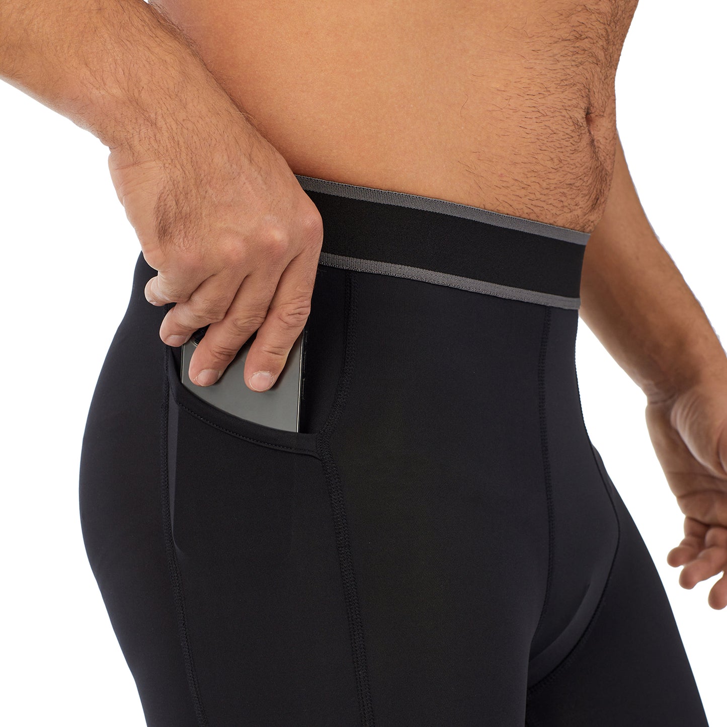 Black;Model is wearing size M. He is 6'2", Waist 32", Inseam 34".@A man wearing black lite compression pant.