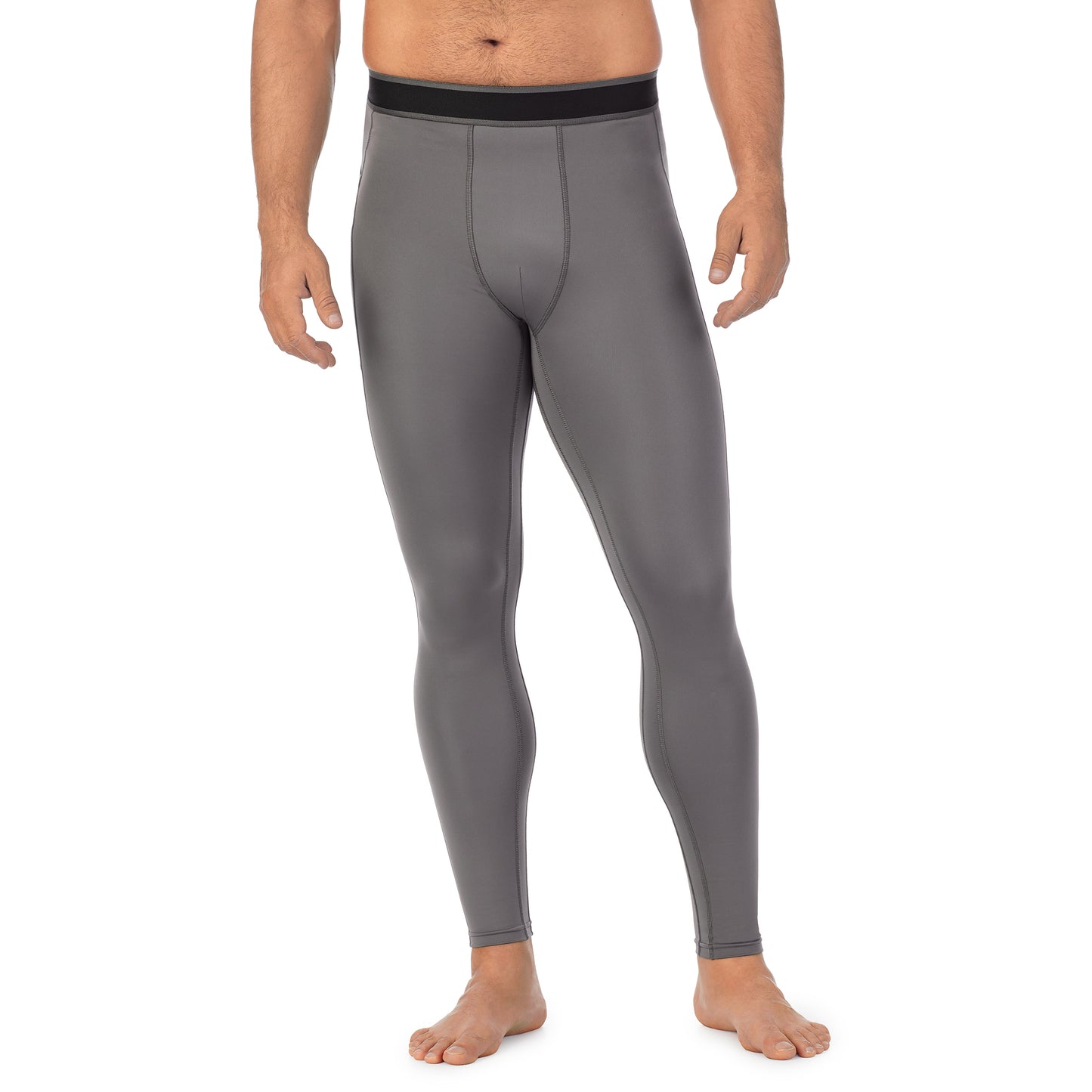 Nickel Grey;Model is wearing size M. He is 6'2", Waist 32", Inseam 34".@A man wearing nickel grey lite compression pant.