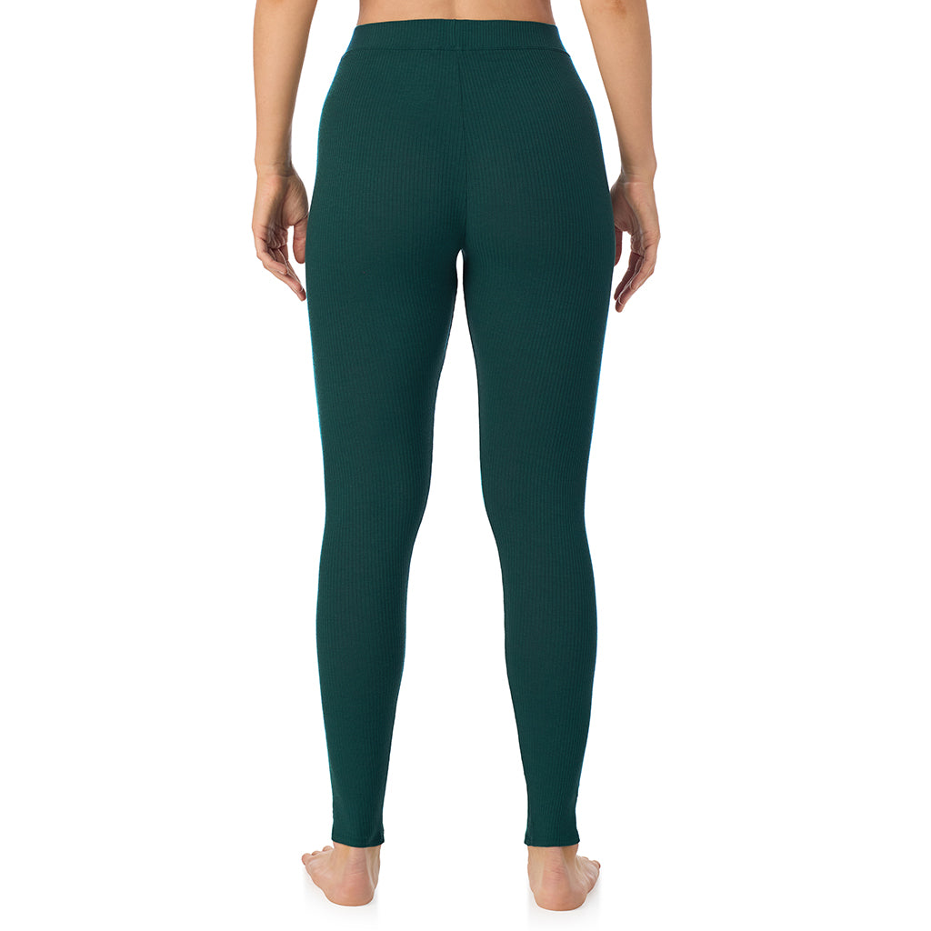 Dark Pine; Model is wearing size S. She is 5'11.5", Bust 34", Waist 26", Hips 37".@ A lady is wearing a Dark Pine Stretch Rib Legging