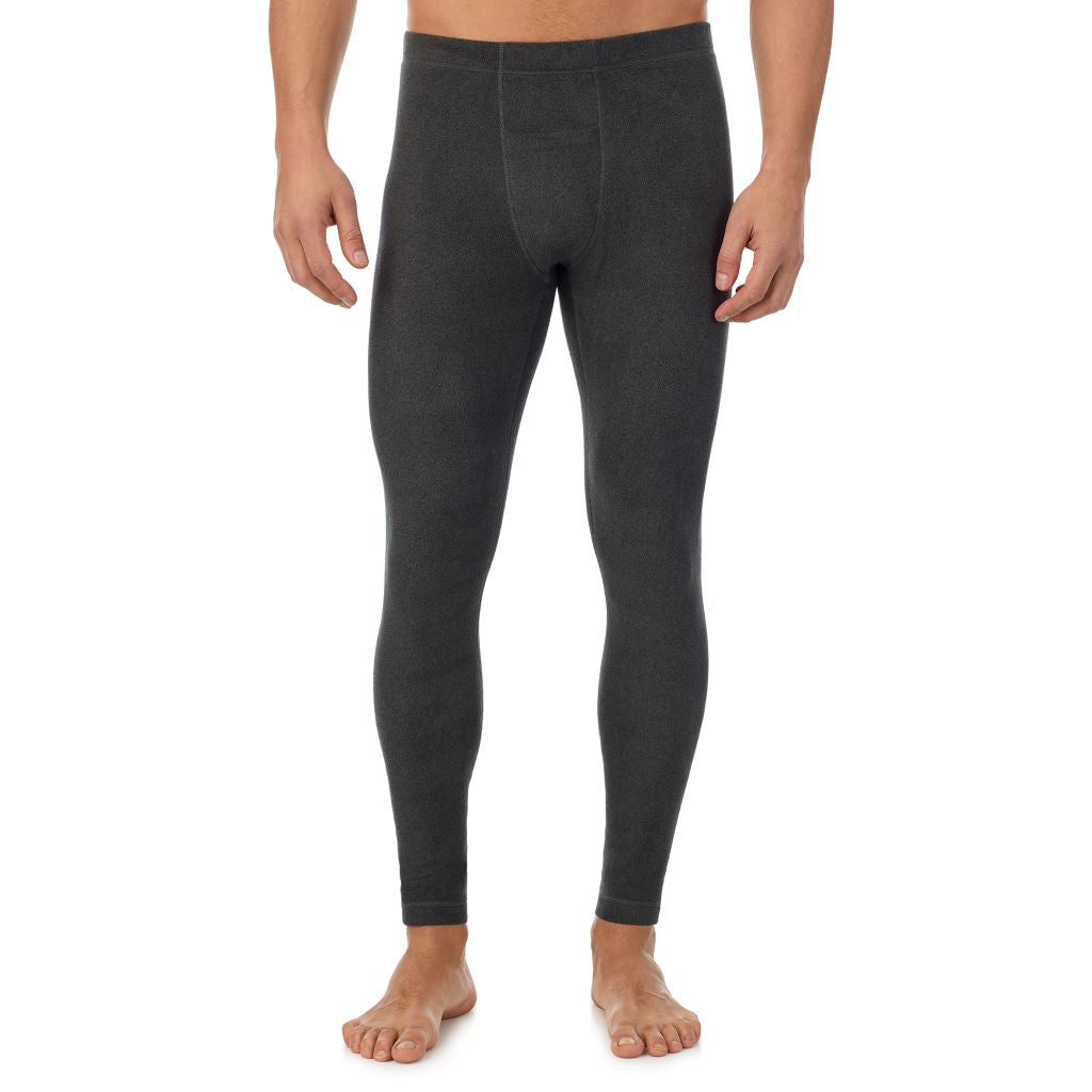 Black Heather; Model is wearing a size M. He is 6’2”, Waist is 32”, Inseam 34”.@A man wearing black heathet fleecewear pant.