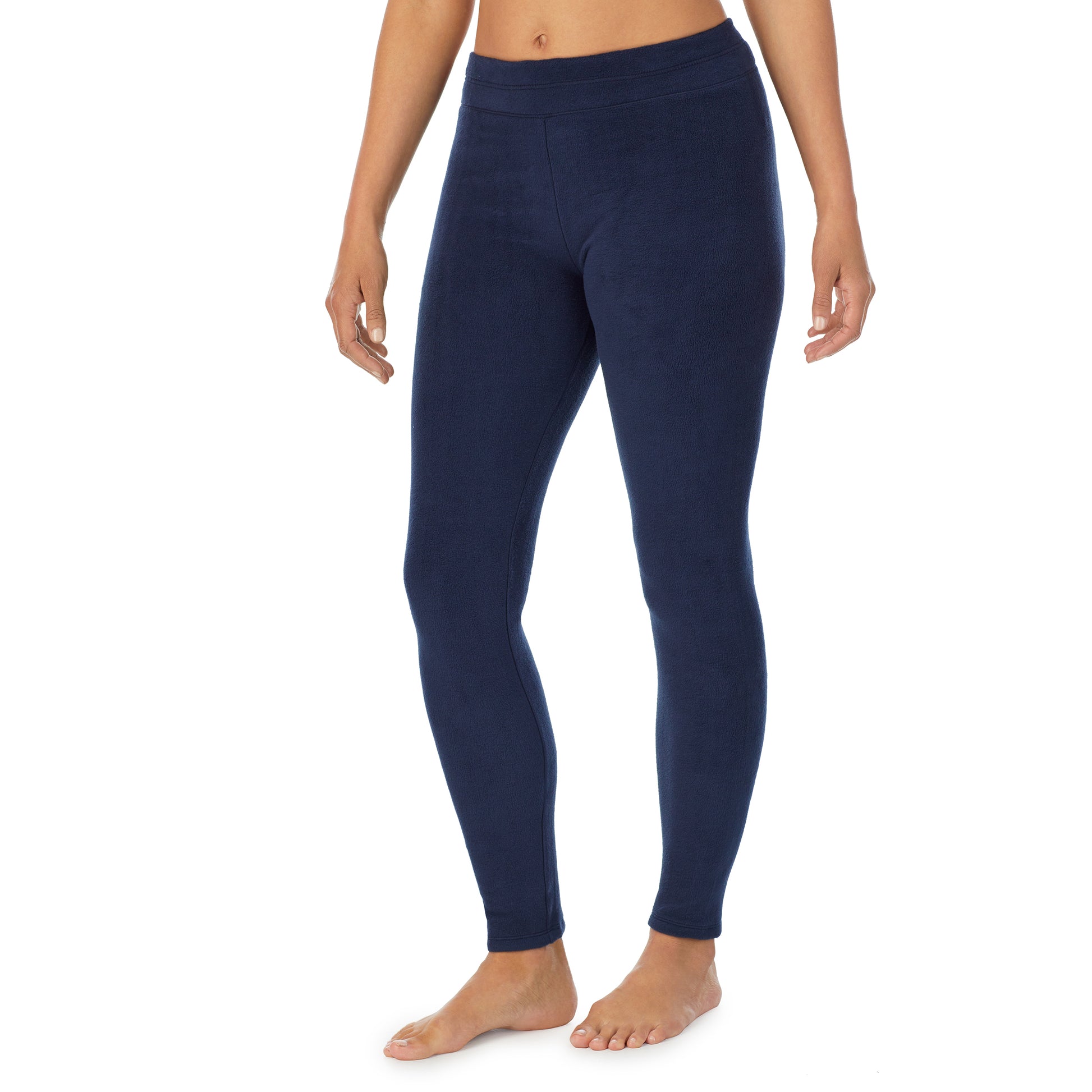A lady wearing navy blazer fleecewear with stretch legging.