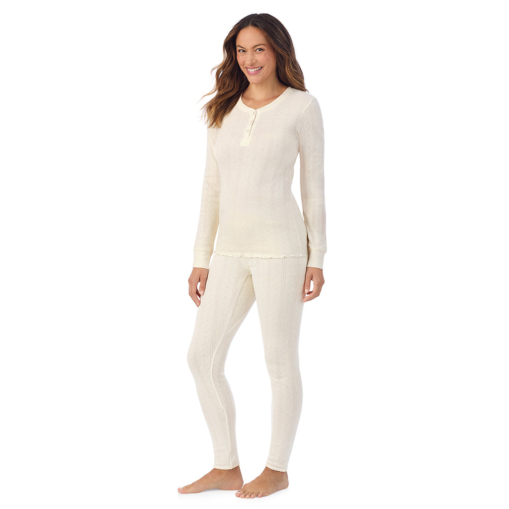 A lady is wearing Cotton Pointelle Long Sleeve Henley