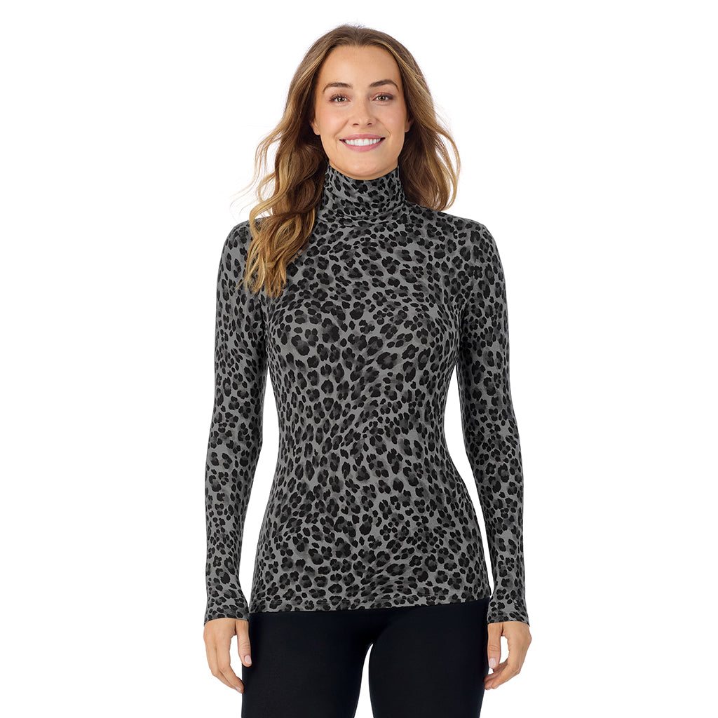 Charcoal Leopard; Model is wearing size S. She is 5'11.5", Bust 34", Waist 26", Hips 37". @A lady wearing charcoal leopard long sleeve turtleneck softwear with stretch top.