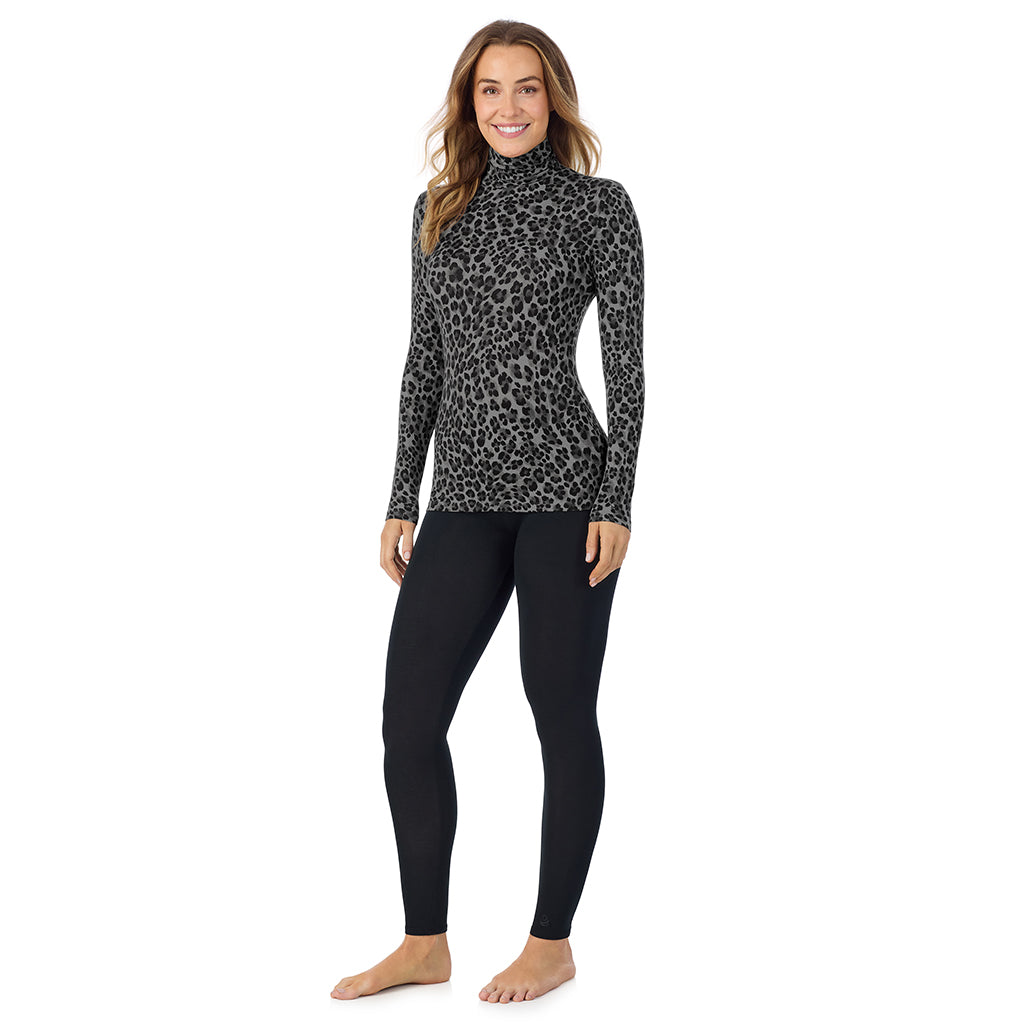 Charcoal Leopard; Model is wearing size S. She is 5'11.5", Bust 34", Waist 26", Hips 37". @A lady wearing charcoal leopard long sleeve turtleneck softwear with stretch top.