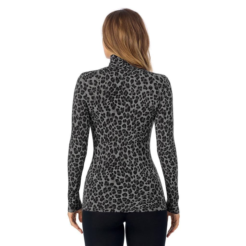 Charcoal Leopard; Model is wearing size S. She is 5'11.5", Bust 34", Waist 26", Hips 37". @A lady wearing charcoal leopard long sleeve turtleneck softwear with stretch top.