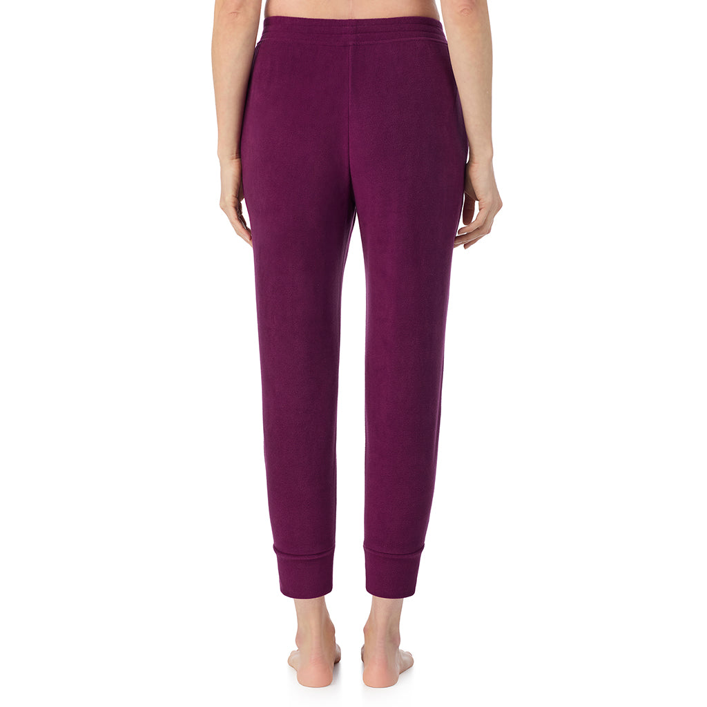 A lady wearing Dark Purple Cuddl Duds x Jennifer Lake Fleecewear with Stretch Cropped Jogger