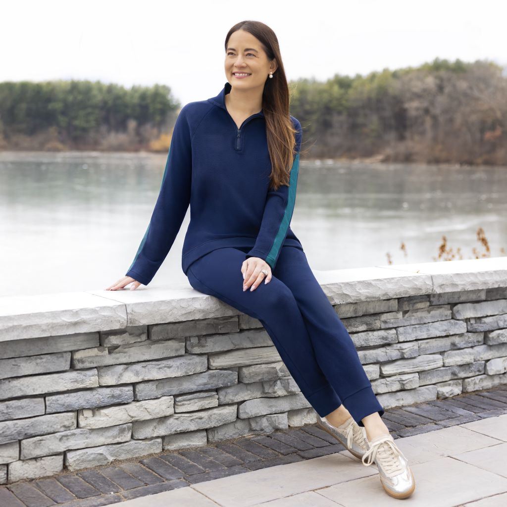 A lady wearing Navy Blazer Cuddl Duds x Jennifer Lake Fleecewear with Stretch Cropped Jogger
