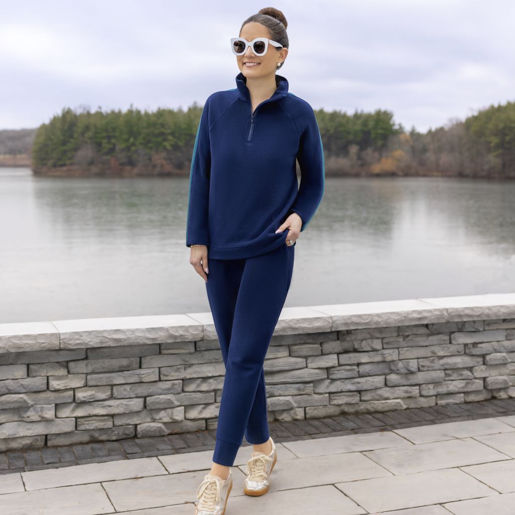 A lady wearing Navy Blazer Cuddl Duds x Jennifer Lake Fleecewear with Stretch Cropped Jogger