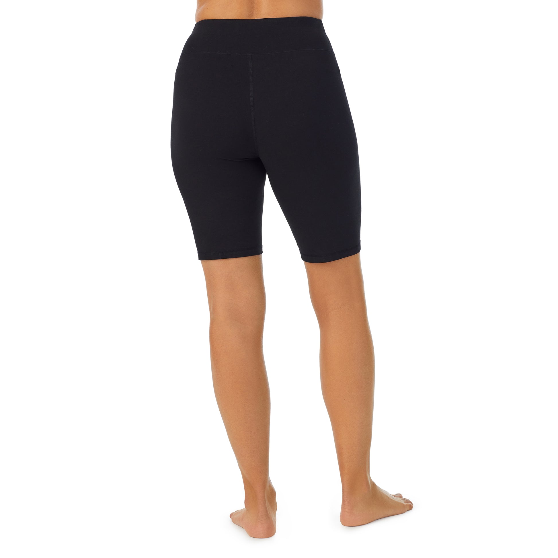 A lady wearing black cottonwear short.