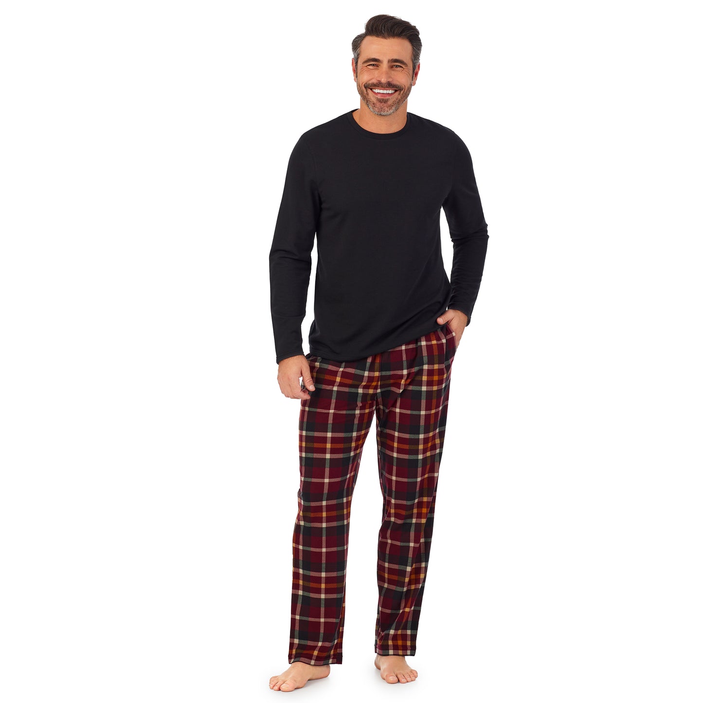 Red Plaid;Model is wearing size M. He is 6'2", Waist 32", Inseam 34".@A man wearing black Mens Cozy Lodge Long Sleeve Crew and red plaid Pajama Pant 2-pc Set