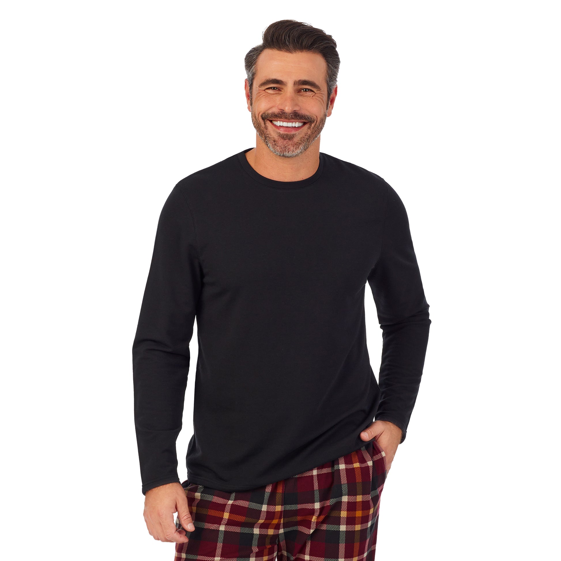 Red Plaid;Model is wearing size M. He is 6'2", Waist 32", Inseam 34".@A man wearing black Mens Cozy Lodge Long Sleeve Crew and red plaid Pajama Pant 2-pc Set