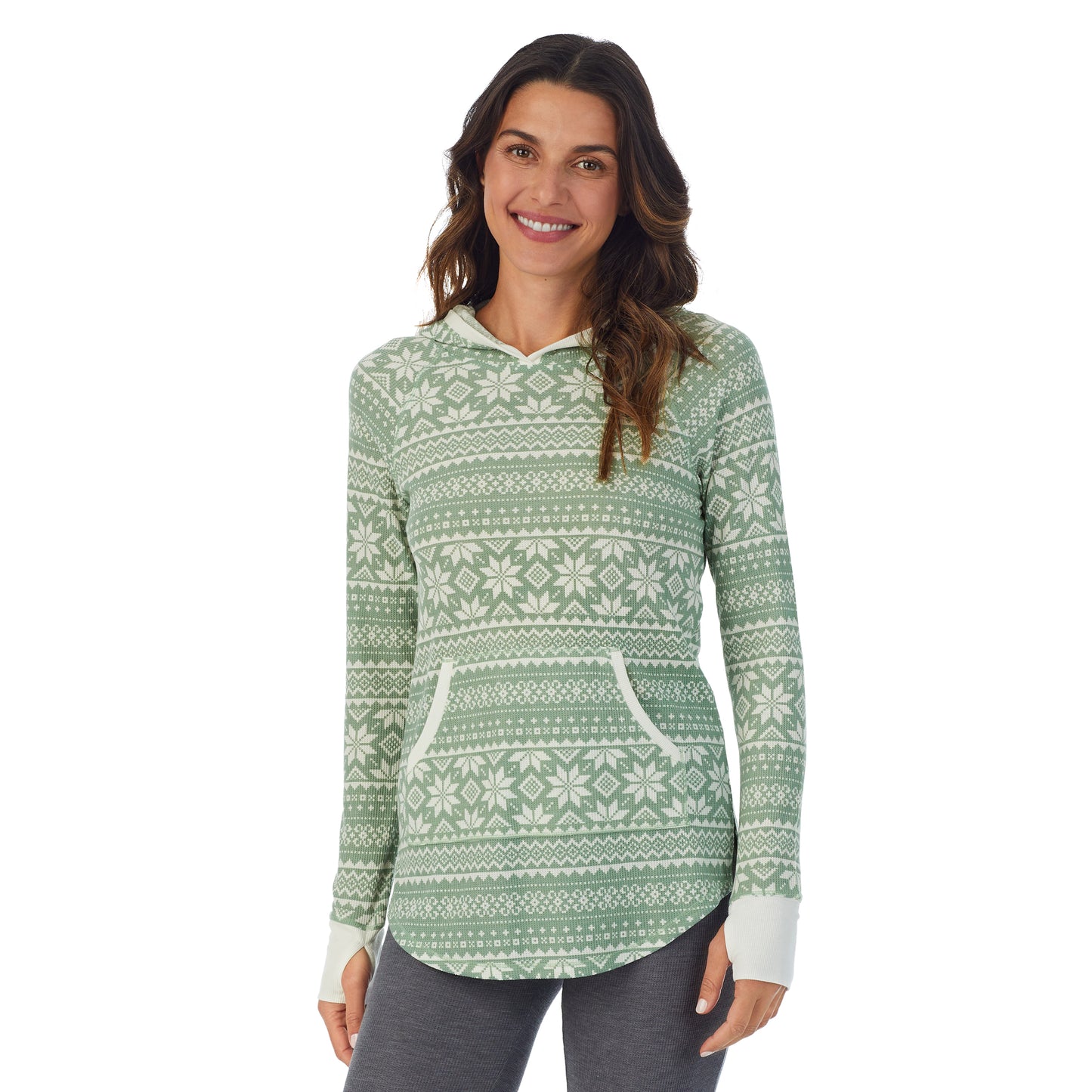 Soft Olive Fairisle; Model is wearing size S. She is 5’9”, Bust 34”, Waist 25.5”, Hips 36.5”. @A lady wearing a Soft Olive Fairisle long sleeve hoodie tunic.