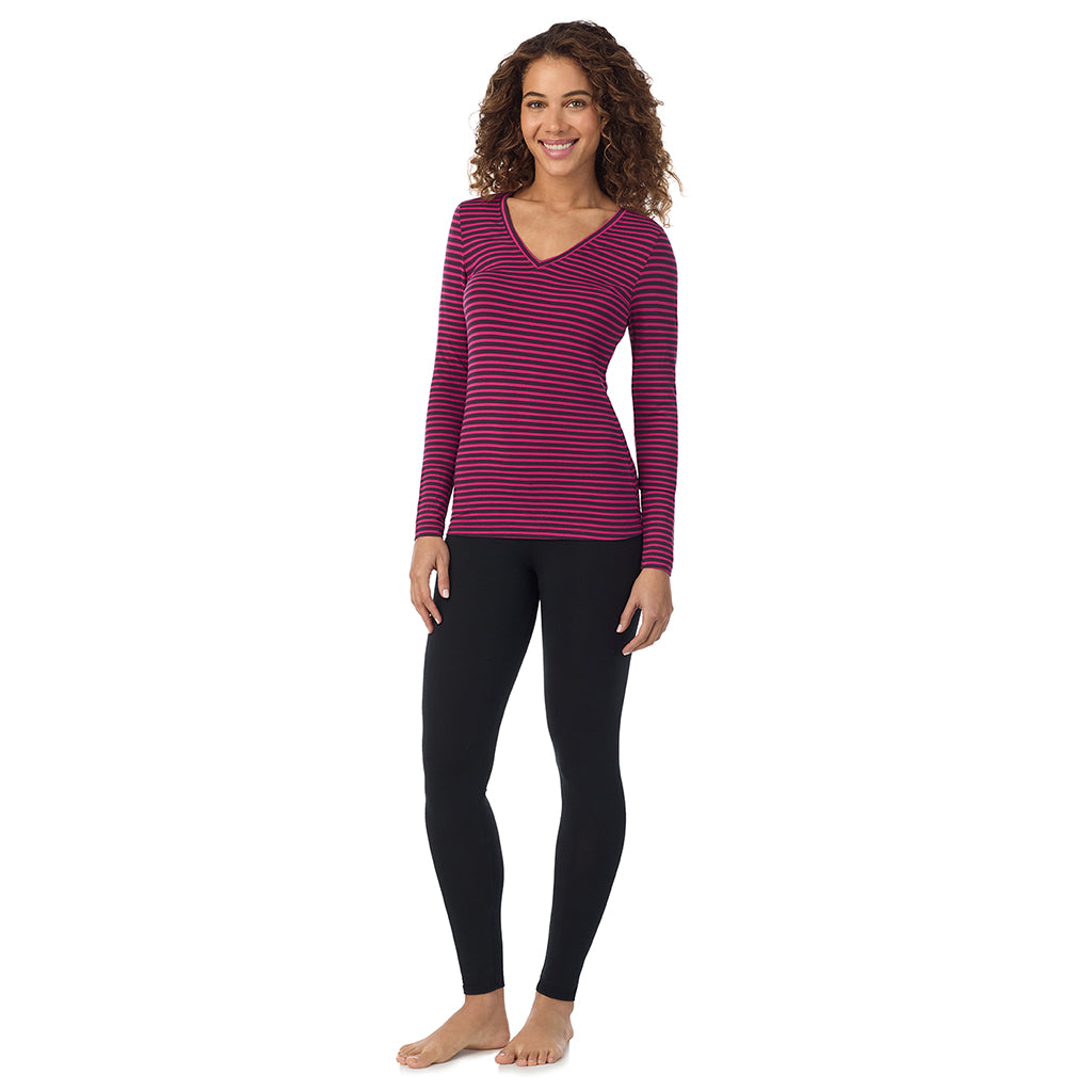 Fuchsia Stripe; Model is wearing size S. She is 5’9”, Bust 34”, Waist 23”, Hips 35”.@A lady wearing fuchsia stripe long sleeve softwear with stretch v-neck.