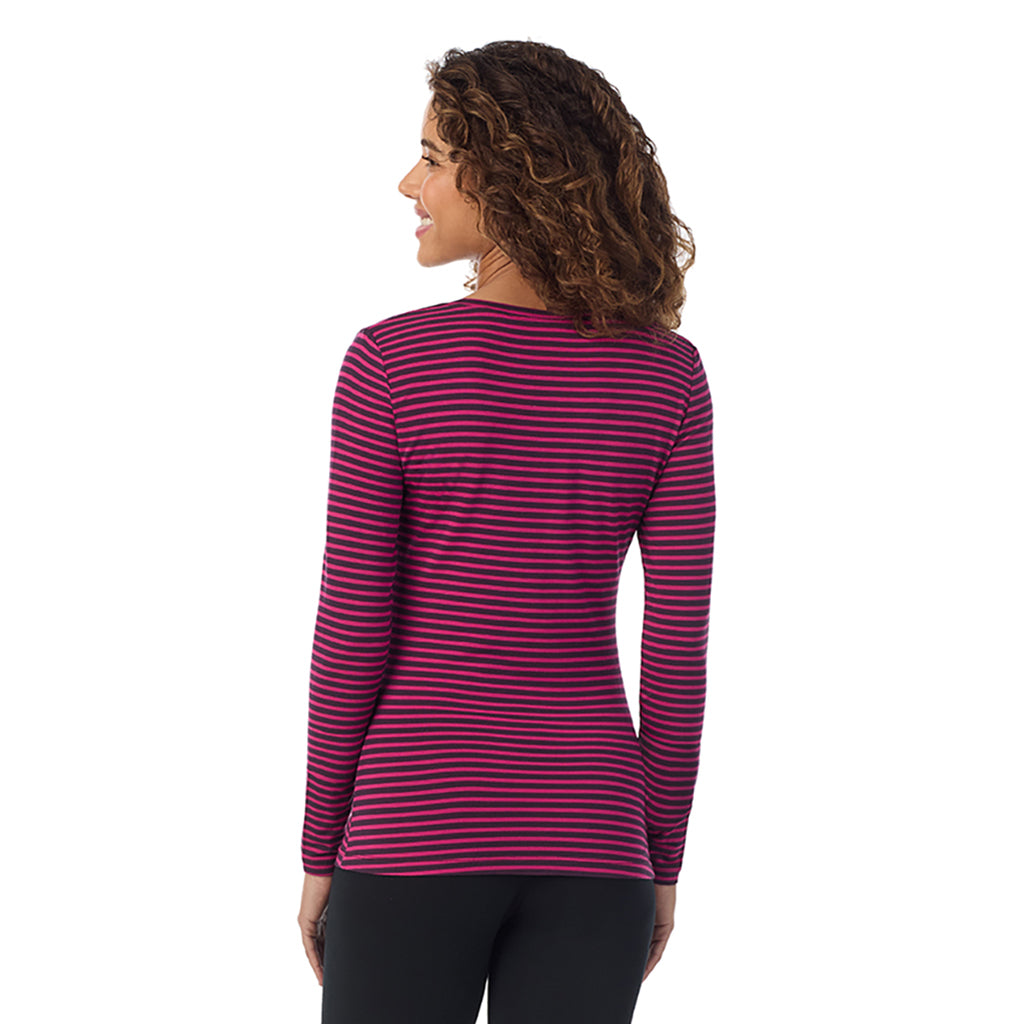 Fuchsia Stripe; Model is wearing size S. She is 5’9”, Bust 34”, Waist 23”, Hips 35”.@A lady wearing fuchsia stripe long sleeve softwear with stretch v-neck.