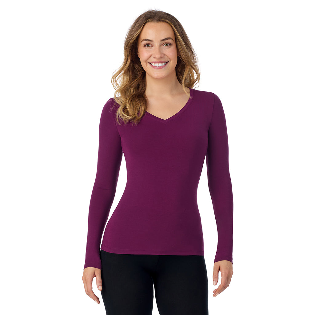 Dark Purple; Model is wearing size S. She is 5'11.5", Bust 34", Waist 26", Hips 37".@A lady wearing dark purple long sleeve softwear with stretch v-neck.