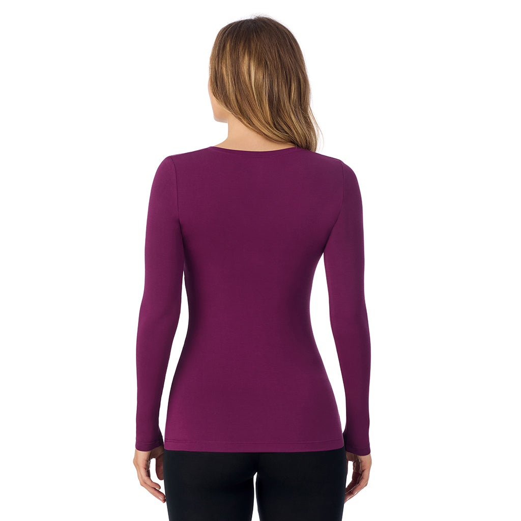Dark Purple; Model is wearing size S. She is 5'11.5", Bust 34", Waist 26", Hips 37".@A lady wearing dark purple long sleeve softwear with stretch v-neck.