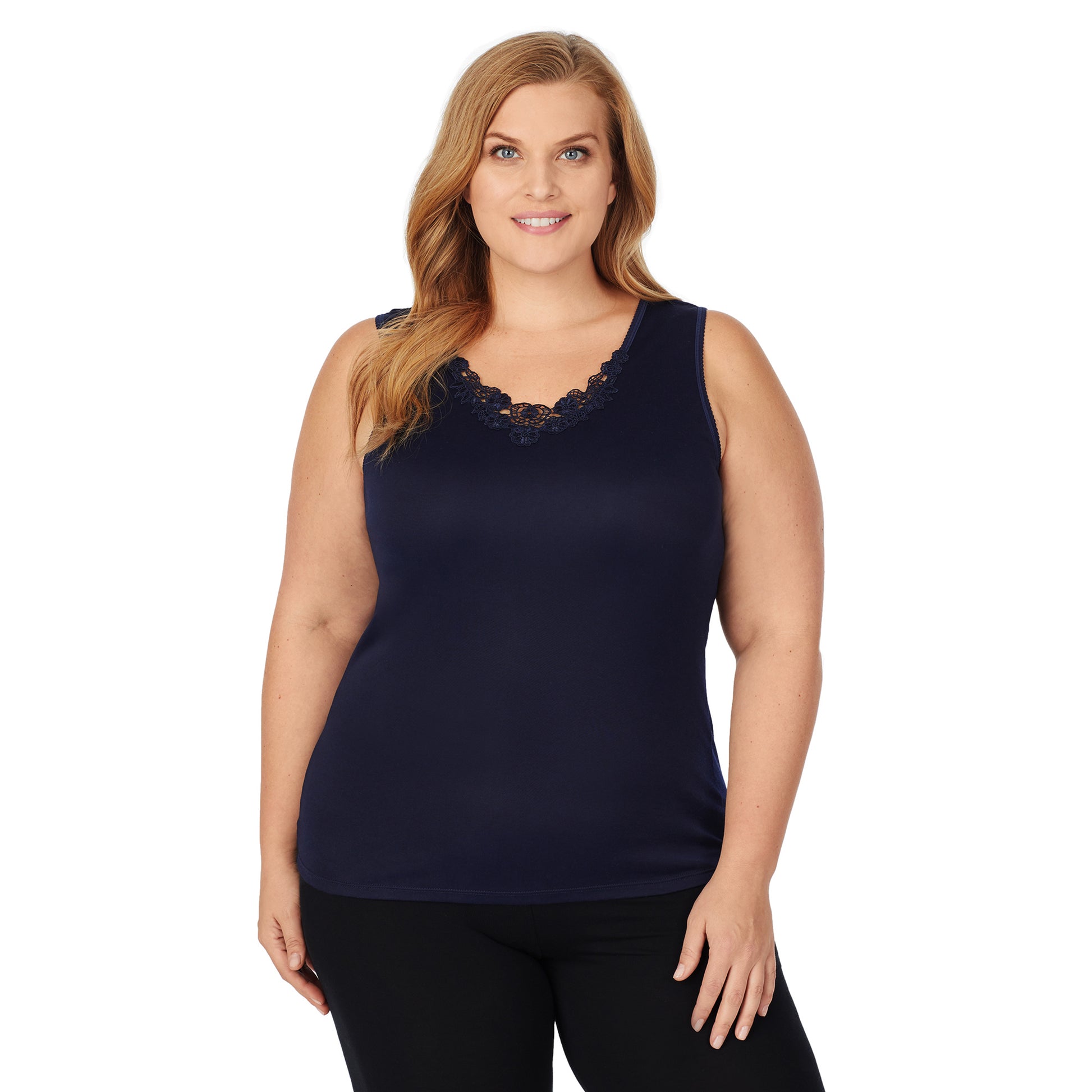 A lady wearing blue softtech venice lace detail cami plus.