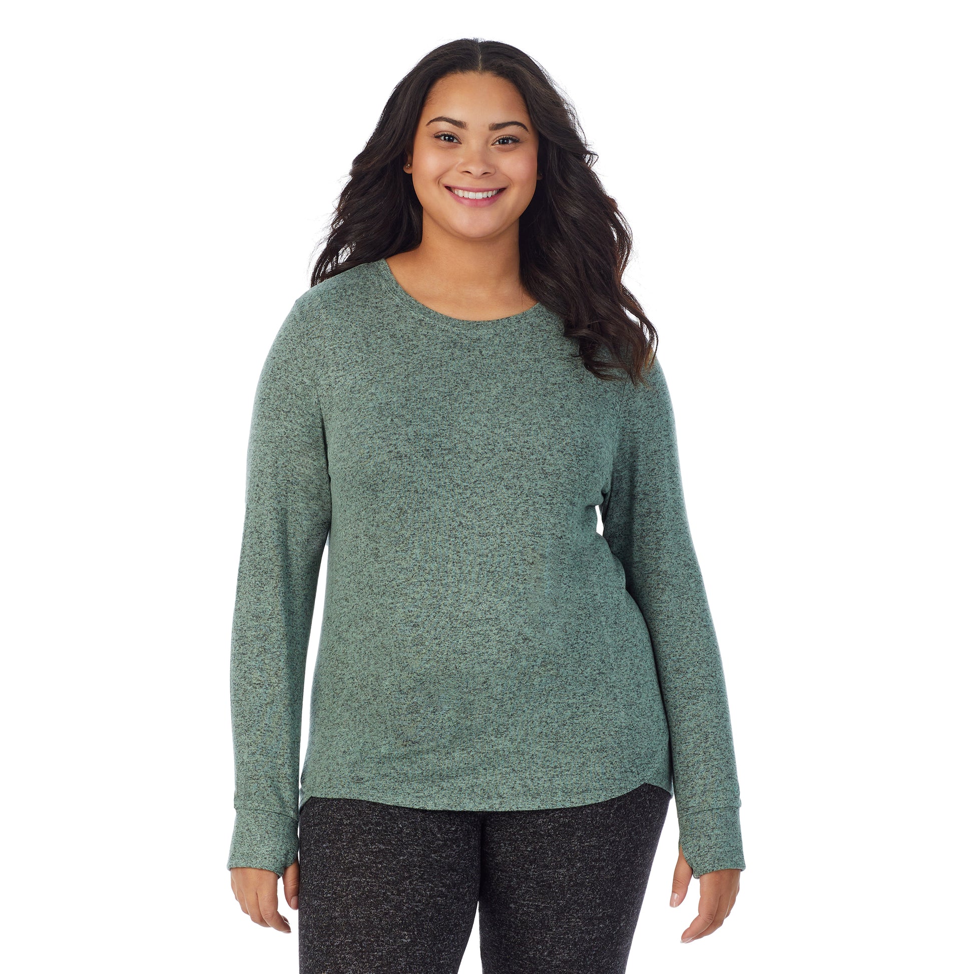A lady wearing a Marled Soft Olive long sleeve crew plus.