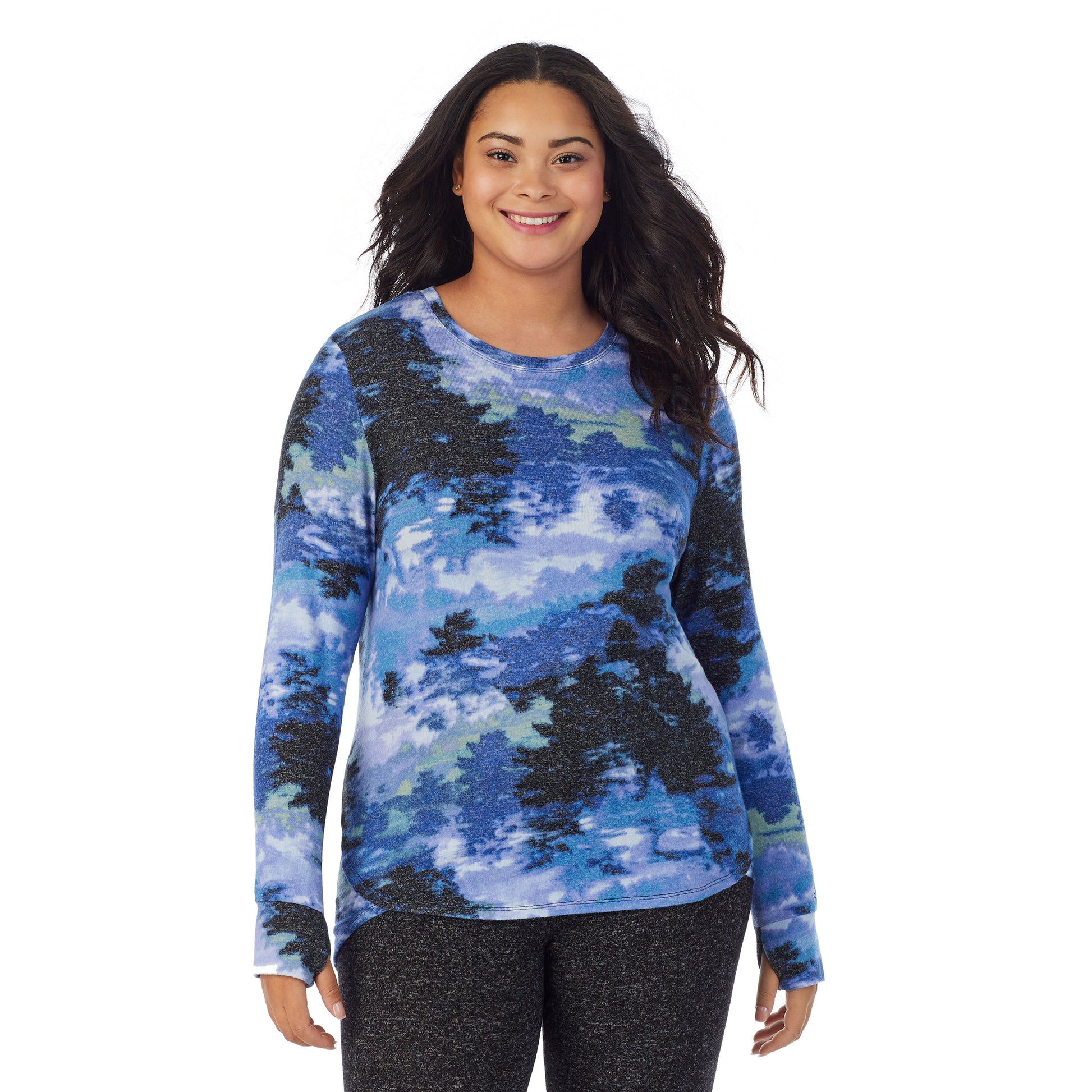 A lady wearing a Misty Forest long sleeve crew plus.