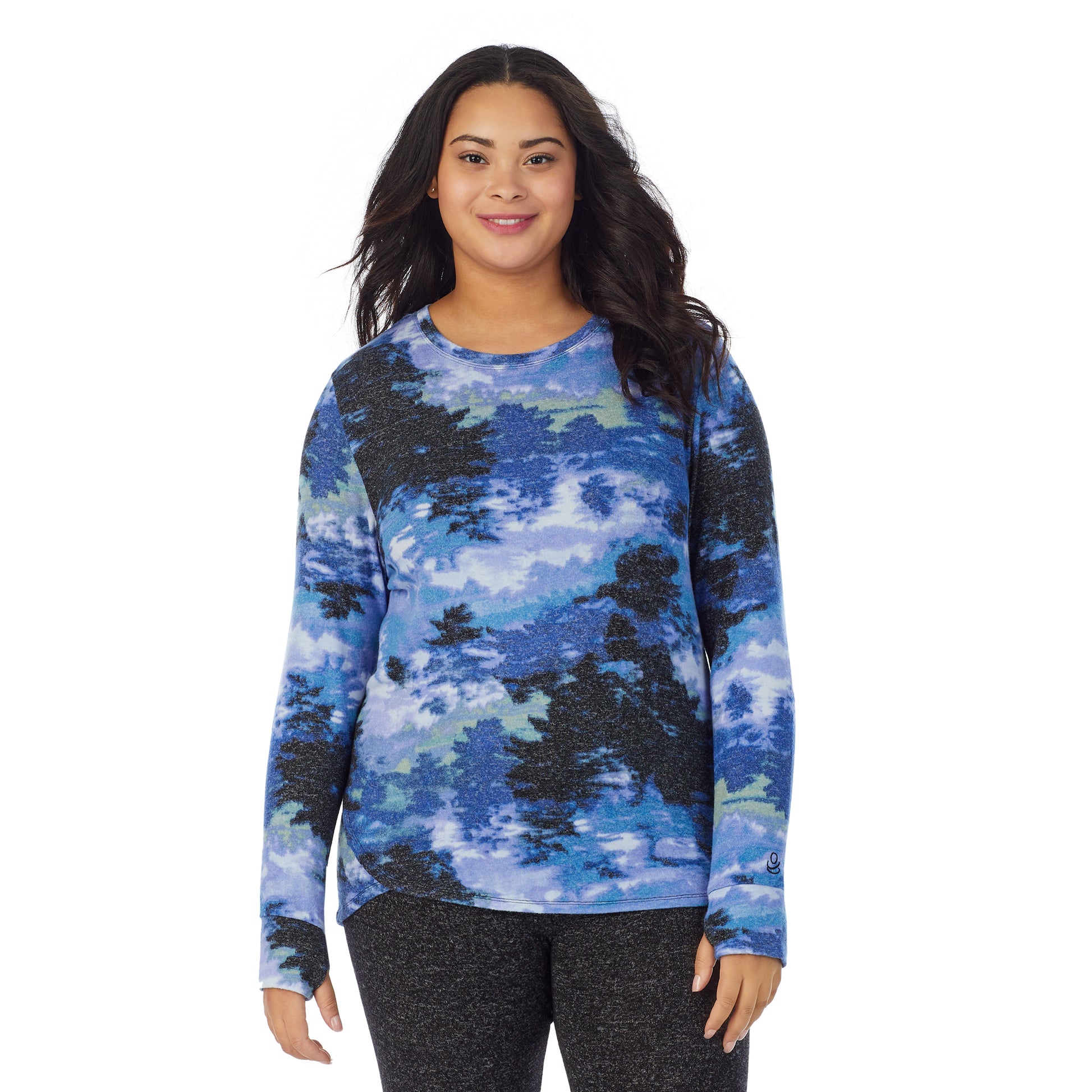 A lady wearing a Misty Forest long sleeve crew plus.
