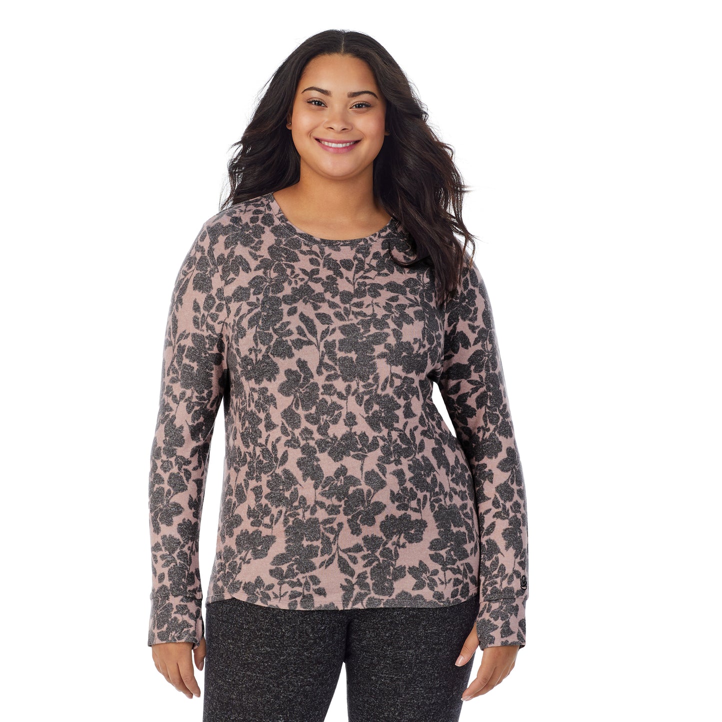 Mauve Floral; Model is wearing size 1X. She is 5’11”, Bust 36”, Waist 36.5”, Hips 47.5”. @A lady wearing a Mauve Floral long sleeve crew plus.