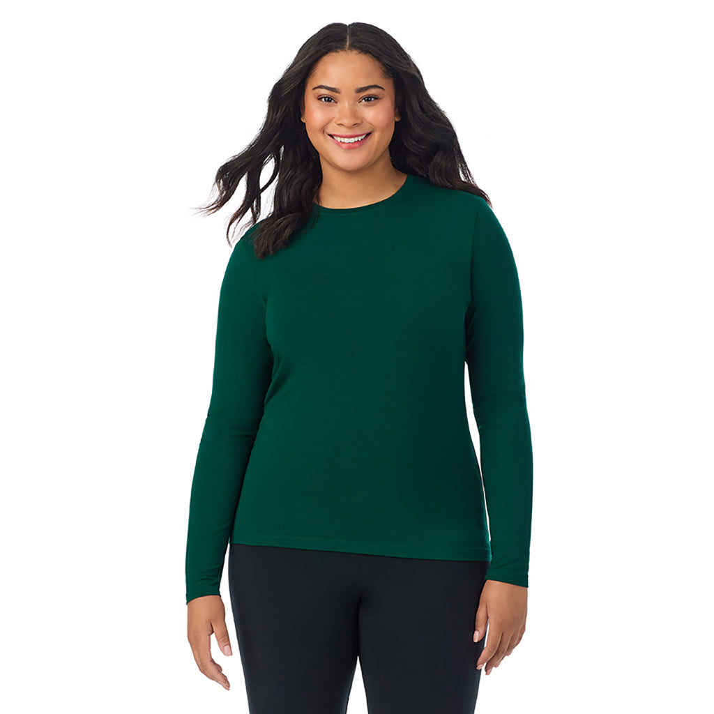 Evergreen ; Model is wearing size 1X. She is 5'11", Bust 36", Waist 36.5", Hips 47.5". @A lady wearing a evergreen long sleeve crew plus.