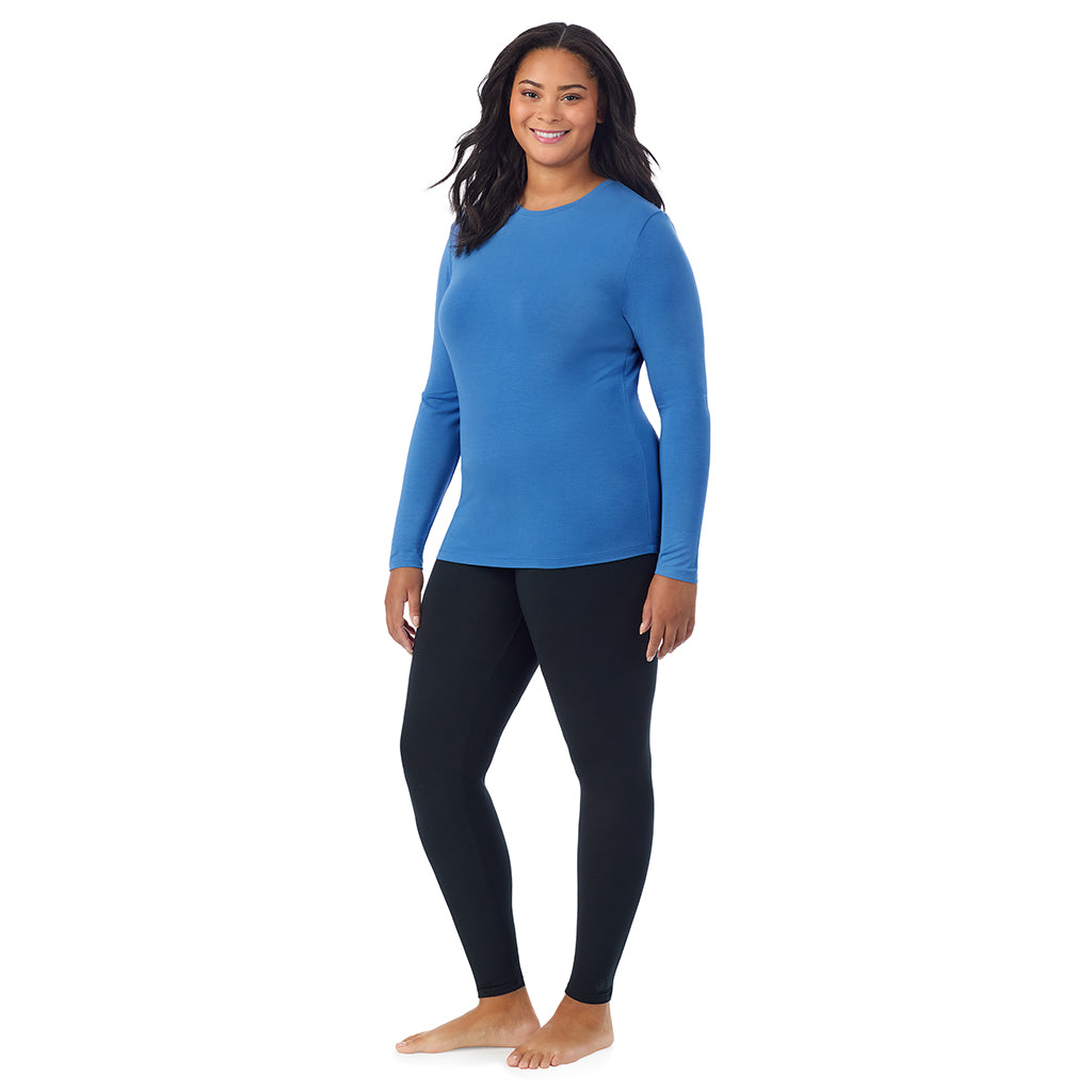 Blue Comet; Model is wearing size 1X. She is 5'11", Bust 36", Waist 36.5", Hips 47.5".@A lady wearing a blue comet long sleeve crew plus.