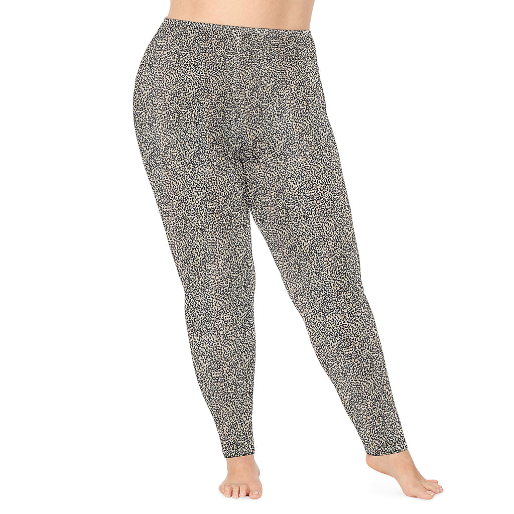 Cheetah;Model is wearing size 1X. She is 5'9", Bust 38", Waist 36", Hips 48.5".@A lady wearing cheetah softwear legging