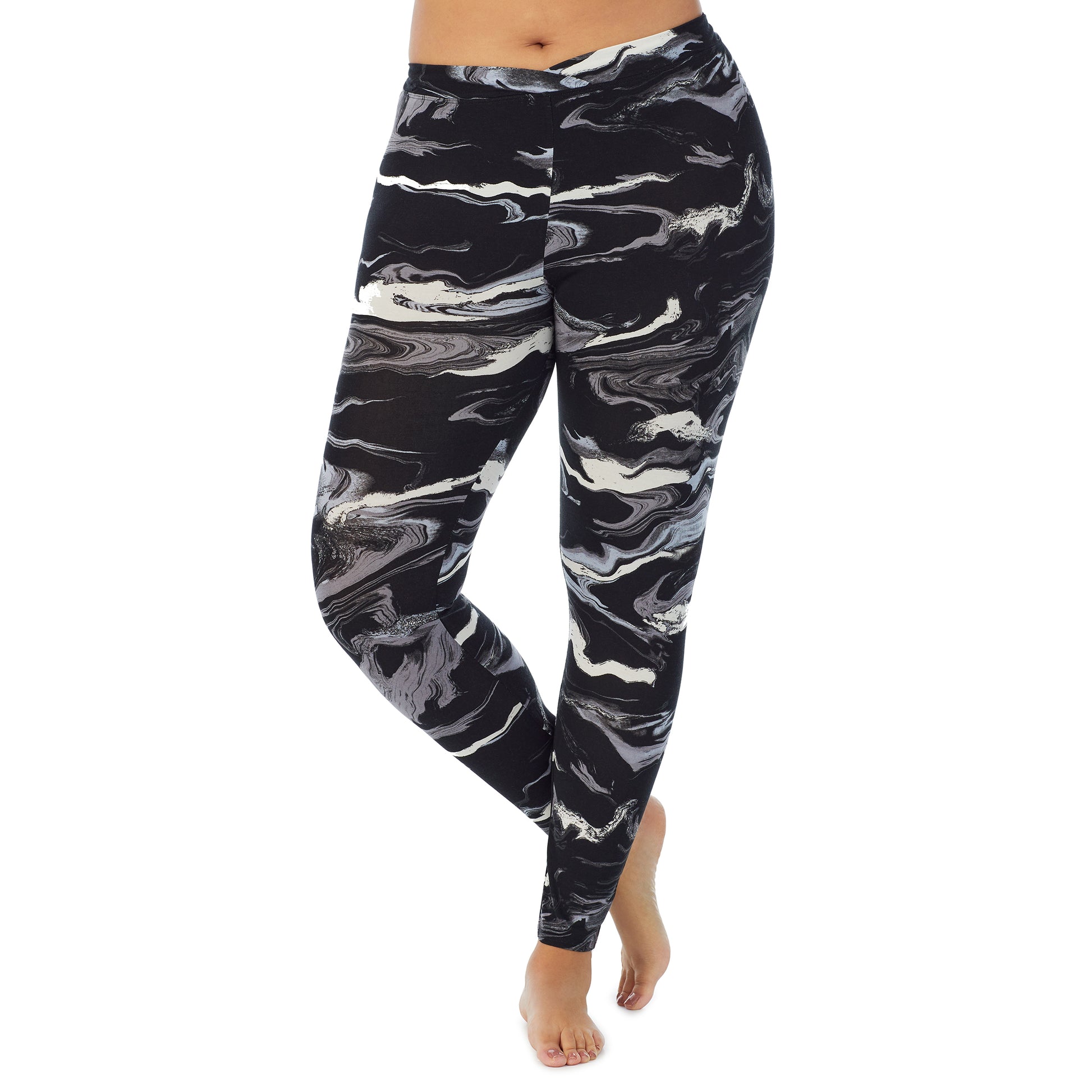 A lady wearing a Black & White Marble stretch legging plus.