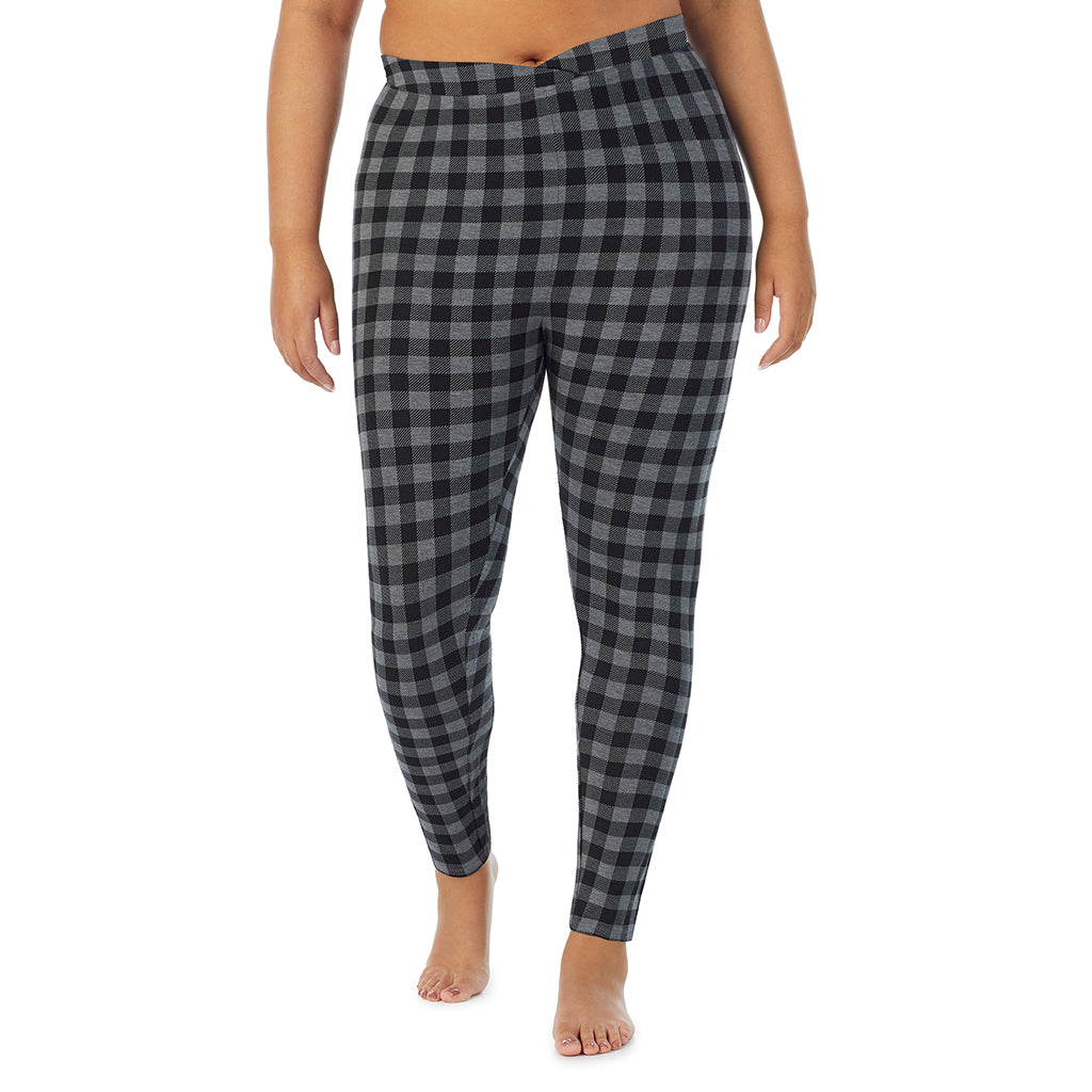 A lady wearing a grey tonal buffalo stretch legging plus.