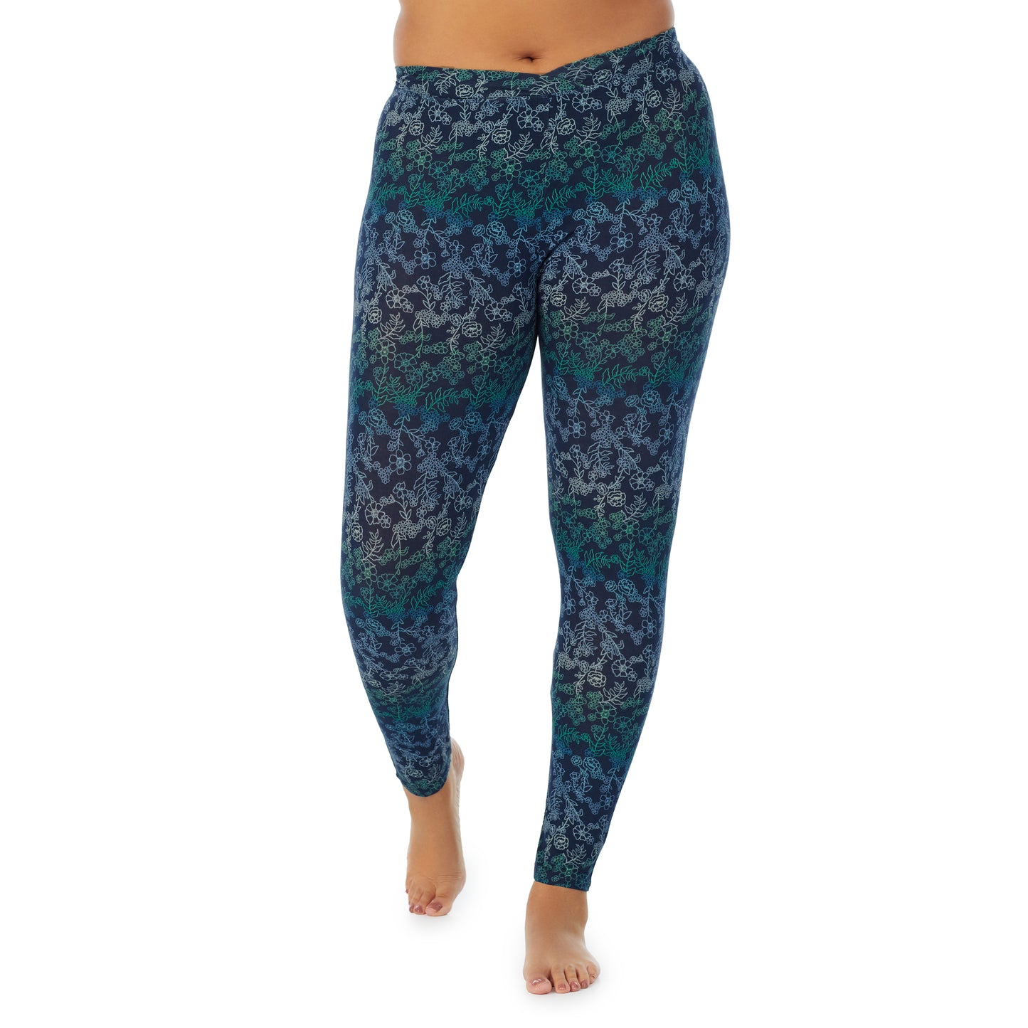 Blue Floral; Model is wearing size 1X. She is 5'11", Bust 36", Waist 36.5", Hips 47.5". @A lady wearing a Blue Floral stretch legging plus.